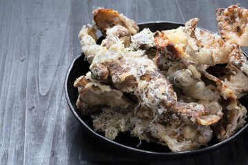 pan of cheesy italian potato skin crisps