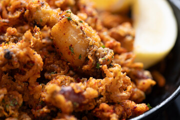 pan of crispy fried baby calamari side dish