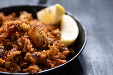 pan of crispy fried baby calamari side dish