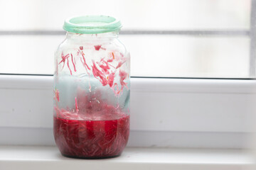 a jar of red sauerkraut
