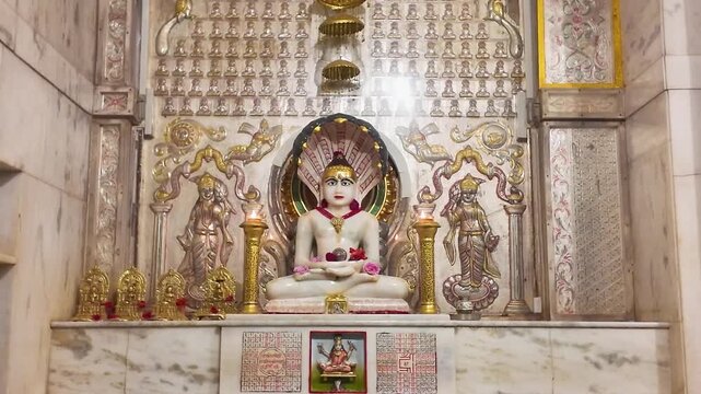 Interior of Jain Mandir with Intricate Karigari &ndash; Beautifully Carved Pillars, Sacred Tirthankar Idols, and Traditional Indian Temple Architecture Showcasing Spiritual Art and Cultural Heritage