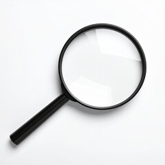 Black magnifying glass casting shadow on a bright white surface