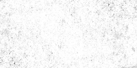 Halftone faded gradient texture. Grunge halftone grit background. White and black sand noise wallpaper.