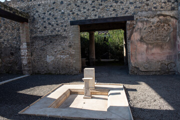 Main room in interior of ancient Roman villa in ruins of old city
