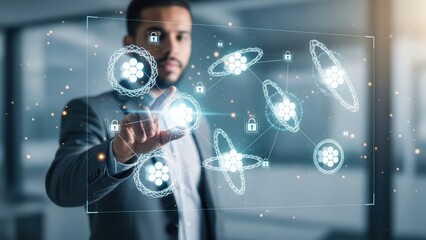 A focused young professional man in a dark suit confidently interacts with a futuristic, glowing digital interface displaying interconnected atomic structures encircled by protective lock icons, all