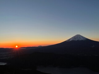 Mount Fuji and Sunrise Over the Horizon