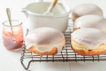 Sweet and homemade donuts with white icing