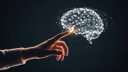 A dramatically lit, photorealistic human hand with a neatly trimmed fingernail gently extends its index finger towards a glowing, intricately detailed wireframe brain constructed from interconnected
