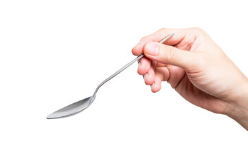 isolated of a man's hand holding a silver steel spoon.