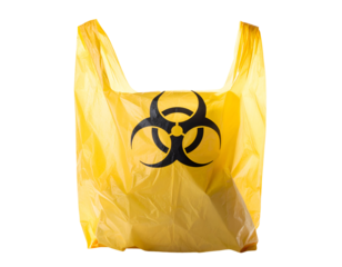 Yellow plastic biohazard bag with black hazard symbol wrinkled medical waste disposal sack on isolated background