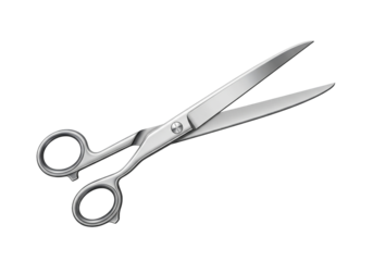 A gleaming pair of silver scissors isolated against a stark black background
