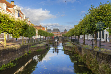 view of the river and the old town of the city Amersfoort in The Netherlands. Canal with a view of there old fortress