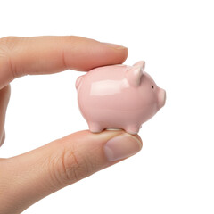 Tiny pink ceramic piggy bank held between a persons fingers isolated on transparent background