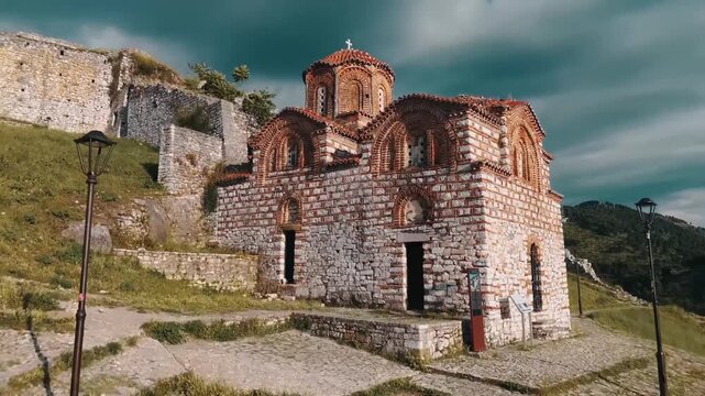 Beautiful establishing shot of ancient houses on hillside in Berat, Albania.