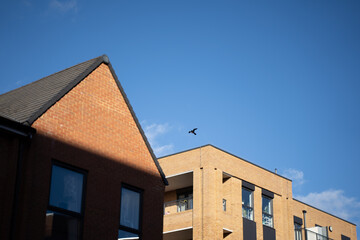 Obraz premium Modern buildings under clear blue sky