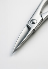 Close-up of stainless steel surgical scissors on a white background. Minimal medical macro still life highlighting precision, sharpness and professional healthcare instruments for clinic and surgery u