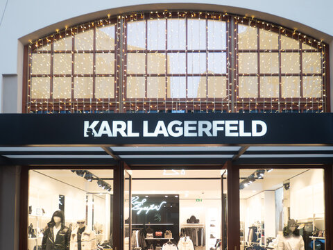 Karl Lagerfeld luxury fashion outlet store in Fidenza Village, Italy, during Christmas season, showcasing products and brands