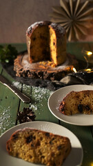 Italian Panettone Loaf with Slices and Powdered Sugar