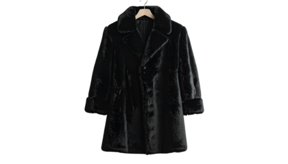 A luxurious, long, black faux fur coat hanging on a wooden hanger against a dark background
