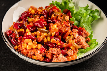 Mexican salad tuna, red beans, corn, peppers, vegetable oil seafood healthy food main course ingredient appetizer fresh tasty food table background country food top view copy space keto and paleo diet