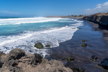 France, La Reunion Island, waves on the windy volcanic coastline 