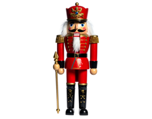 A decorative wooden nutcracker soldier in a vibrant red uniform, posing against black