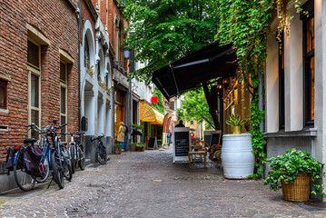 Old narrow street of the historic city center of Antwerpen (Antwerp), Belgium. Cozy cityscape of Antwerp. Architecture and landmark of Antwerpen