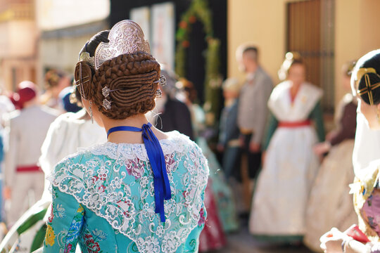 hairstyle, headdress and typical accessories of the fallera dress in valencia, spain.