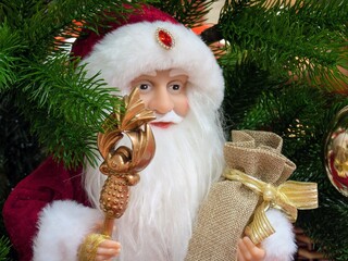 Toy Santa claus and christmas tree