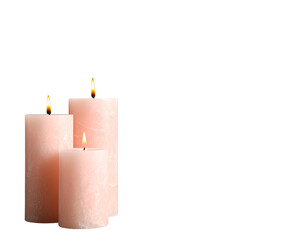 Set of three elegant pink candles with flames