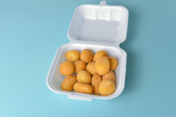 Appetizer set - coxinha and cheese balls with bright props