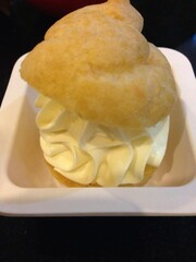 a serving of Choux cream in white bowl