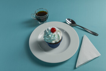 Cupcake on a minimalist table setting