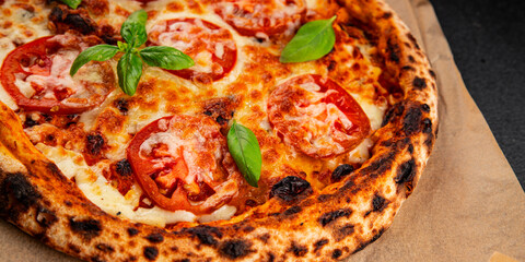 Pizza tomato margarita fast food natural product tasty snack fresh delicious gourmet food background on the table rustic top view copy space