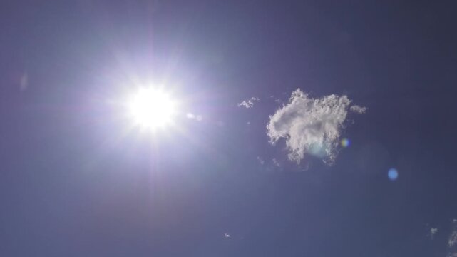 Sun Shining Above Beautiful Stormy Clouds.  brightening the puffy clouds with the sun. sky perspective. gorgeous sky filled with sunlight. 
