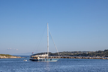 Fototapeta premium Sailboat and Ionian sea, Paxos, Greece