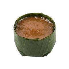 Sweet chinese cake wrapped in green banana leaves isolated on white