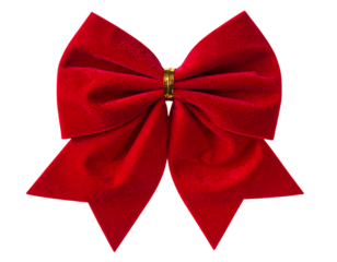 A vibrant, plush, red velvet bow with golden center, isolated on a black background