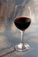 A glass of red wine.