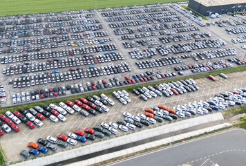Plakat Aerial view of a storage facility for new cars