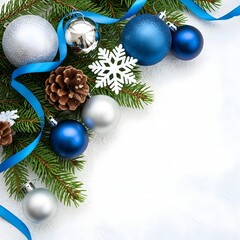 Christmas decorations with blue and silver ornaments on fir branches