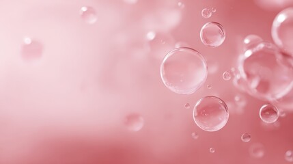 Abstract background of floating, translucent bubbles or spheres on a soft pink base, creating a subtle three-dimensional look.
