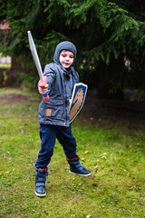 Kid boy in knight costume