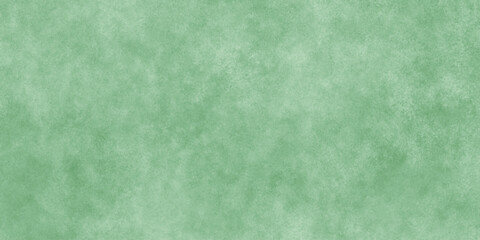Abstract Elegant dark green background with mottled vintage texture in old fancy background design, texture of colored parchment paper.	