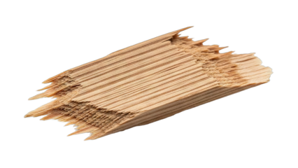 A stack of wooden toothpicks on a white background.
