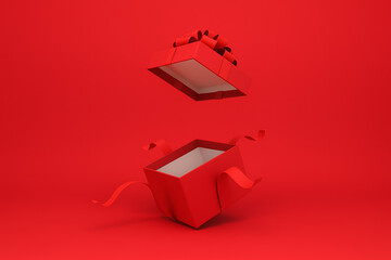 Minimalistic open red present box flying in the air with floating lid and ribbons against a saturated monochromatic red background mockup