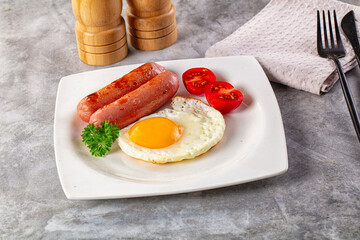 Breakfast with egg and sausages