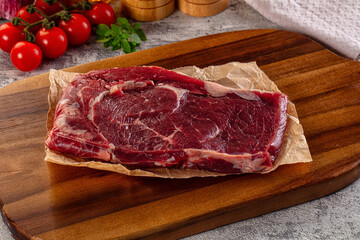 Gourmet raw rib eye steak