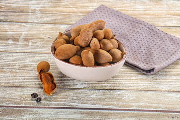 Tropical exotic Tamarind fruit heap