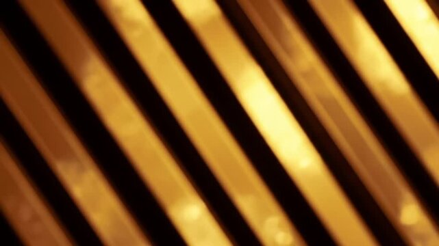 Abstract diagonal golden bars with diffused light create a warm background.